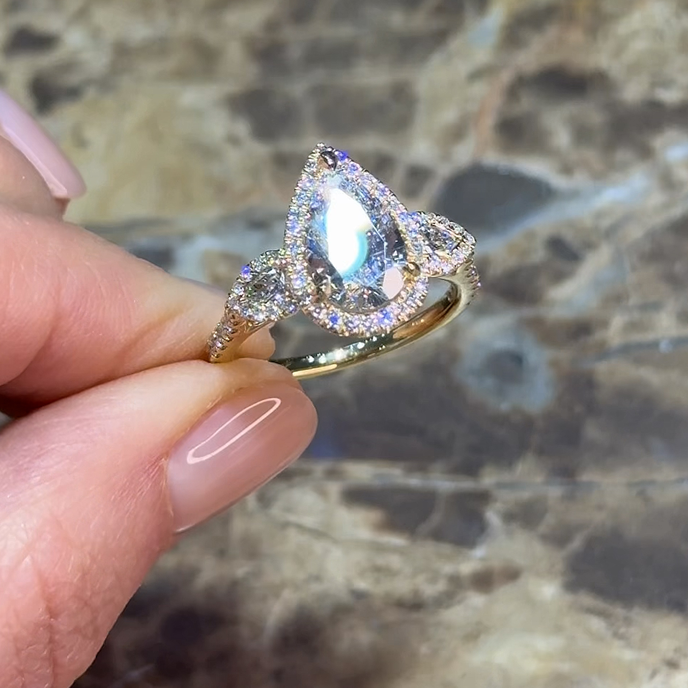 18K Yellow Gold Pear Cut Lab-Grown Diamond Halo Engagement Ring with Pear Side Stones and Half-Set Pavé Band