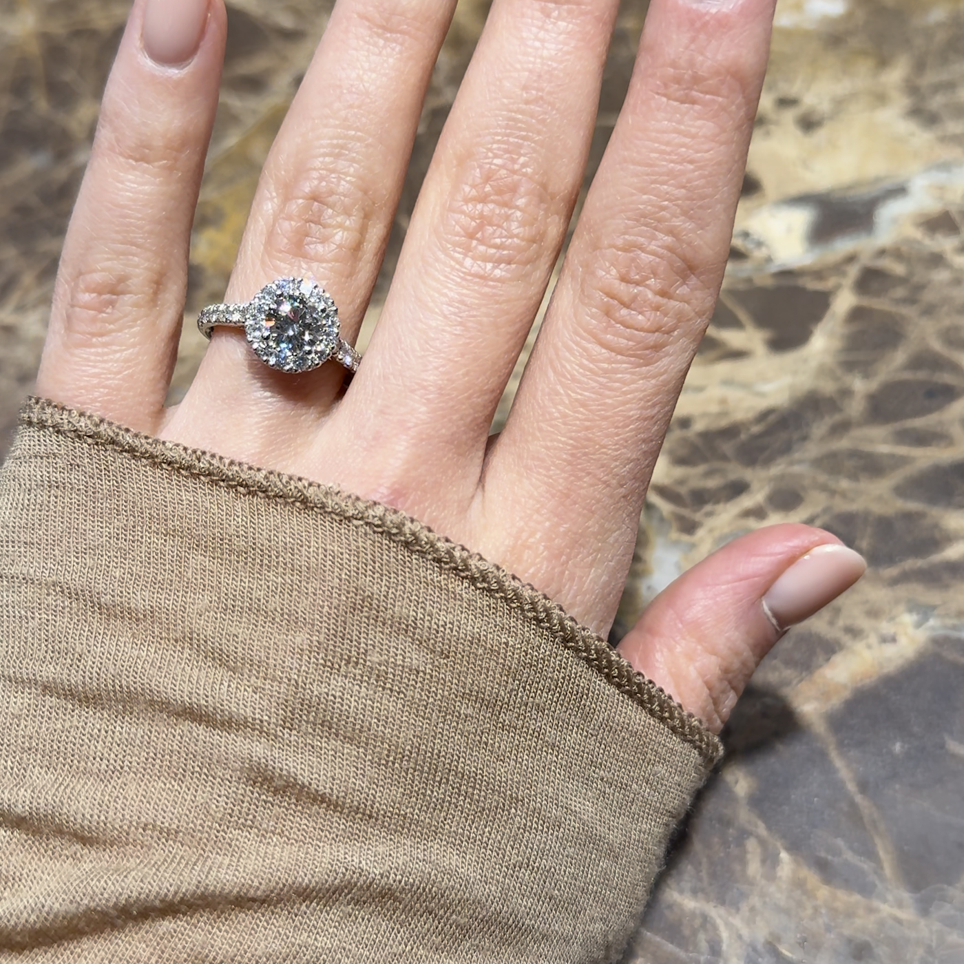 18k white gold. chunky round lab-grown diamond halo engagement ring with pavé band