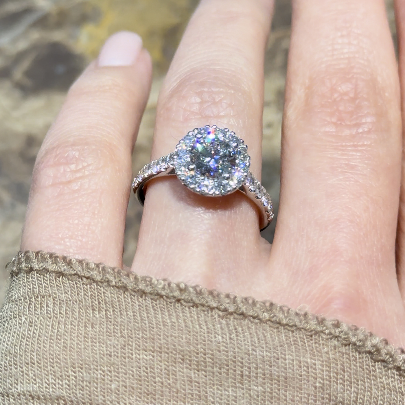 18k white gold. chunky round lab-grown diamond halo engagement ring with pavé band